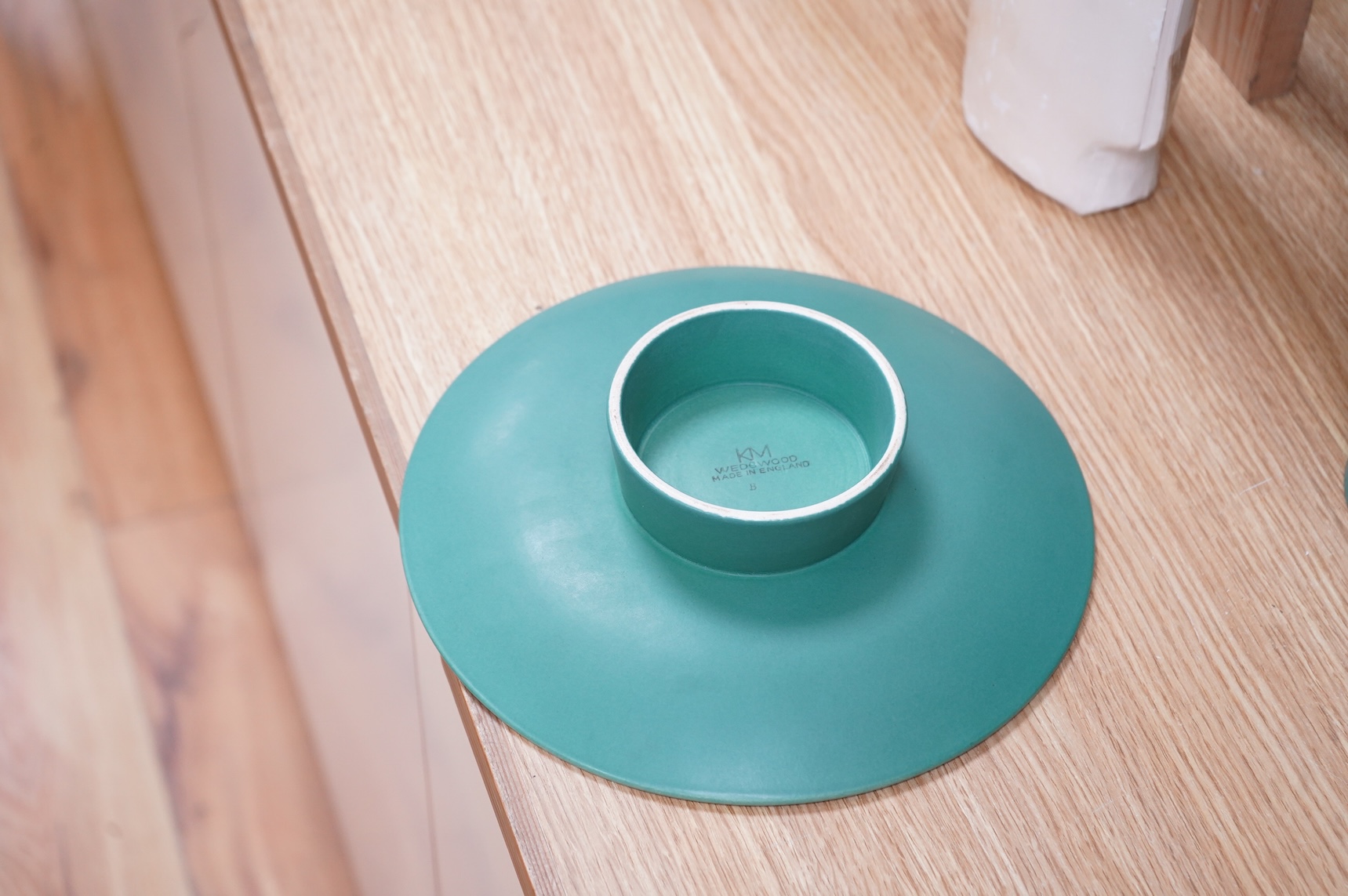 Keith Murray for Wedgwood, a green glazed ribbed tazza or footed dish, 23cm in diameter